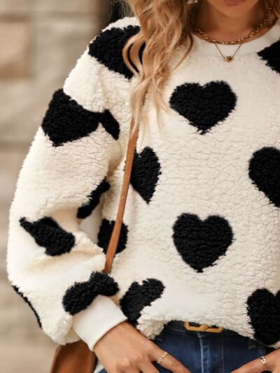 Iphigénie | Pull Douillet à Motifs Cœur – Confort et Style Adorable