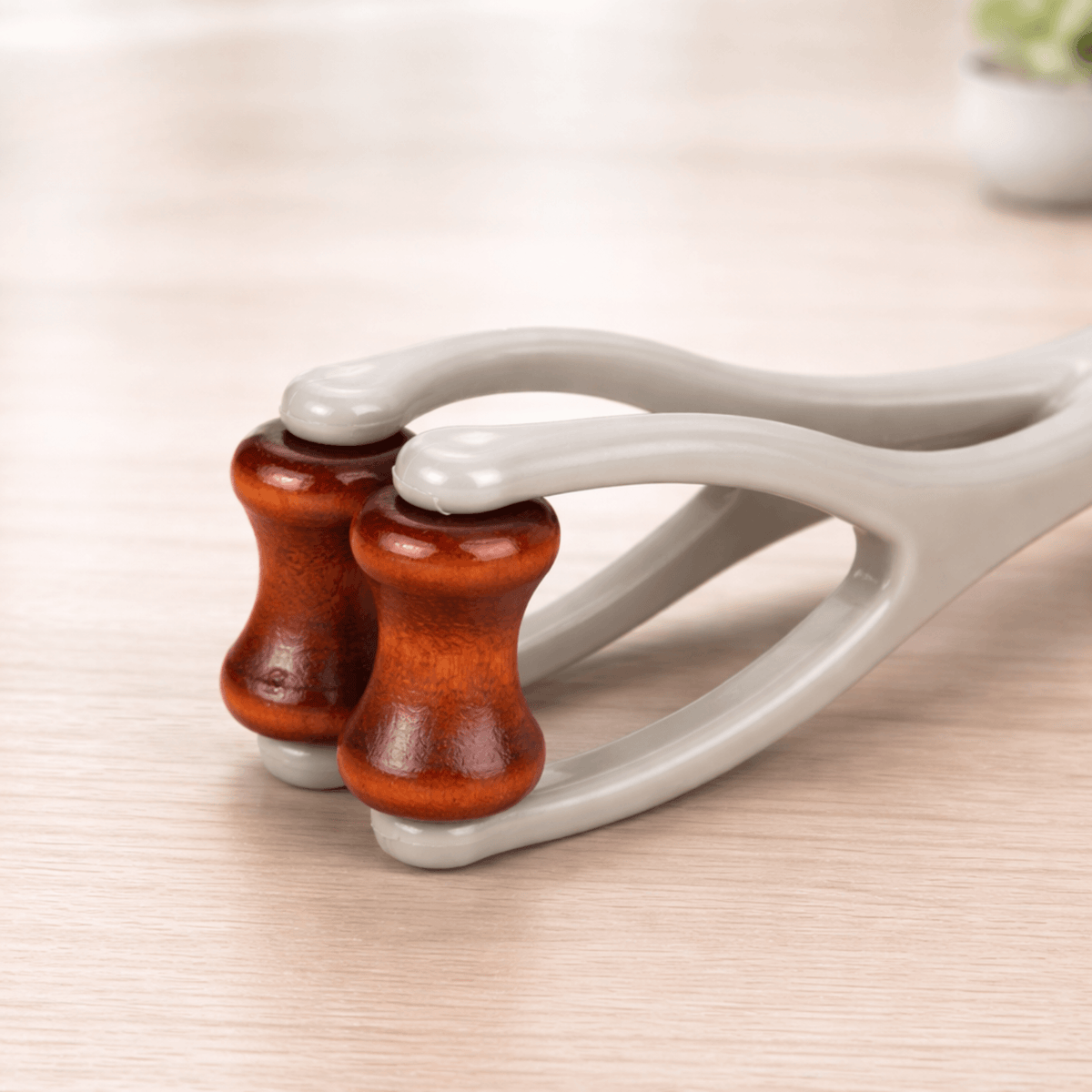 PalmRelief™ | Handmassage-Roller aus natürlichem Bian-Stein