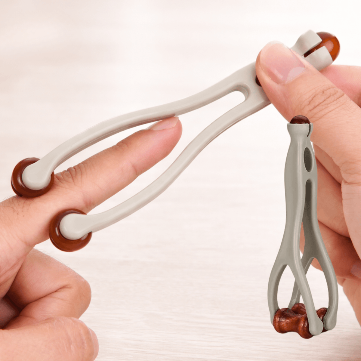 PalmRelief™ | Handmassage-Roller aus natürlichem Bian-Stein